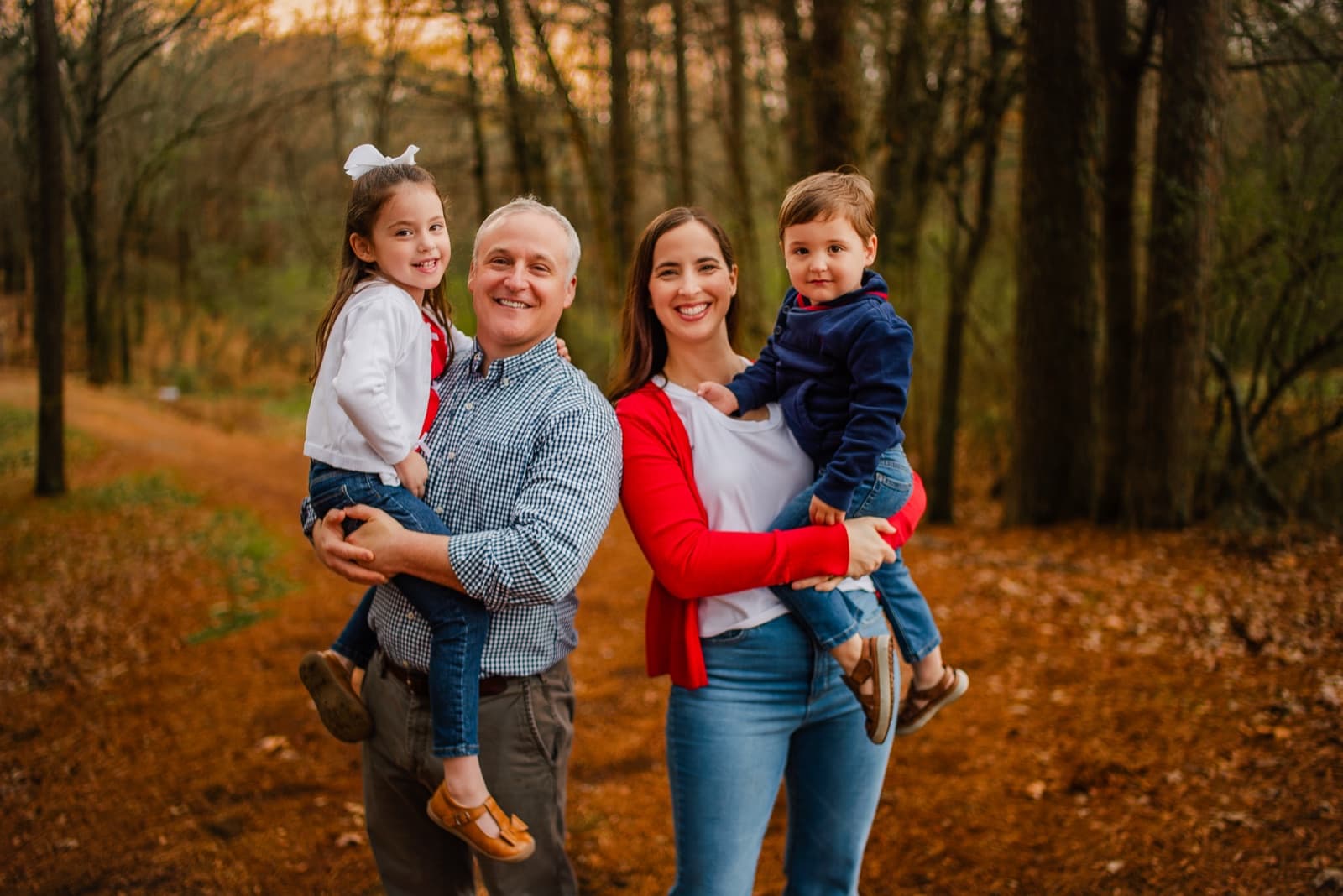 Adam Cossey with his wife Lindsey and their children, Emilia and Thomas